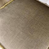 Vintage green two-seater sofa with fringes