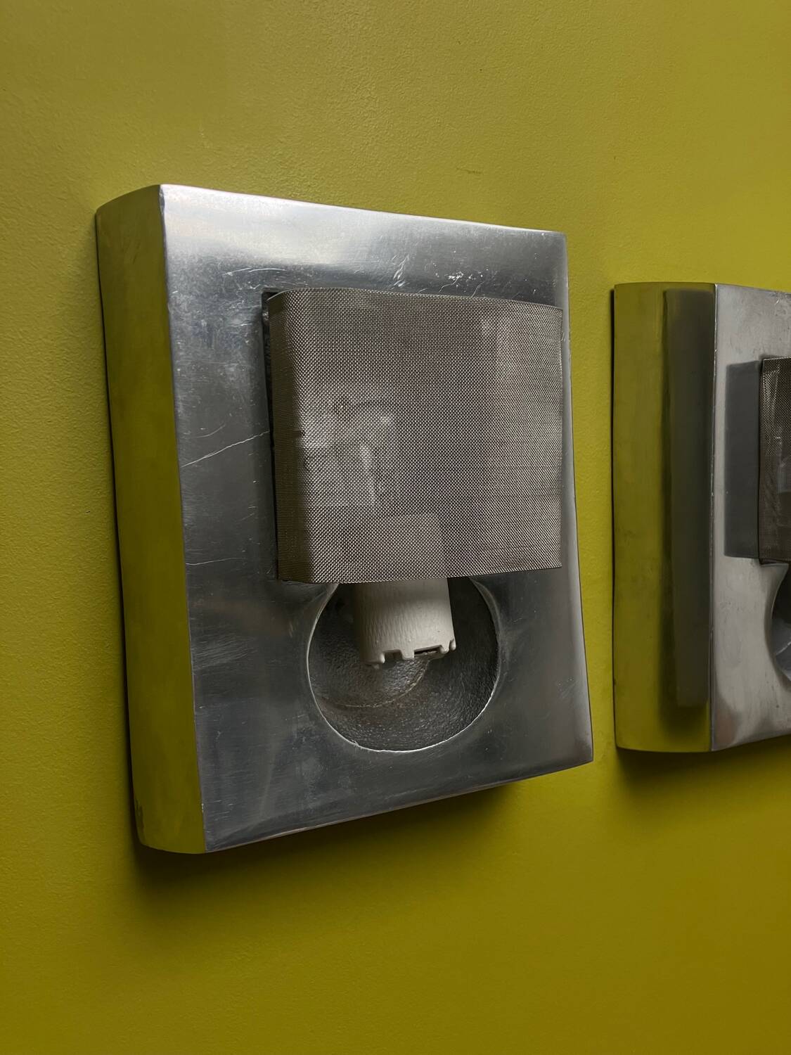 Marie Baratte cast aluminum wall lights