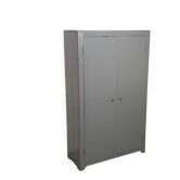Curved wardrobe workshop locker made of wood repainted in grey.