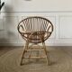Fauteuil coquille en rotin vintage