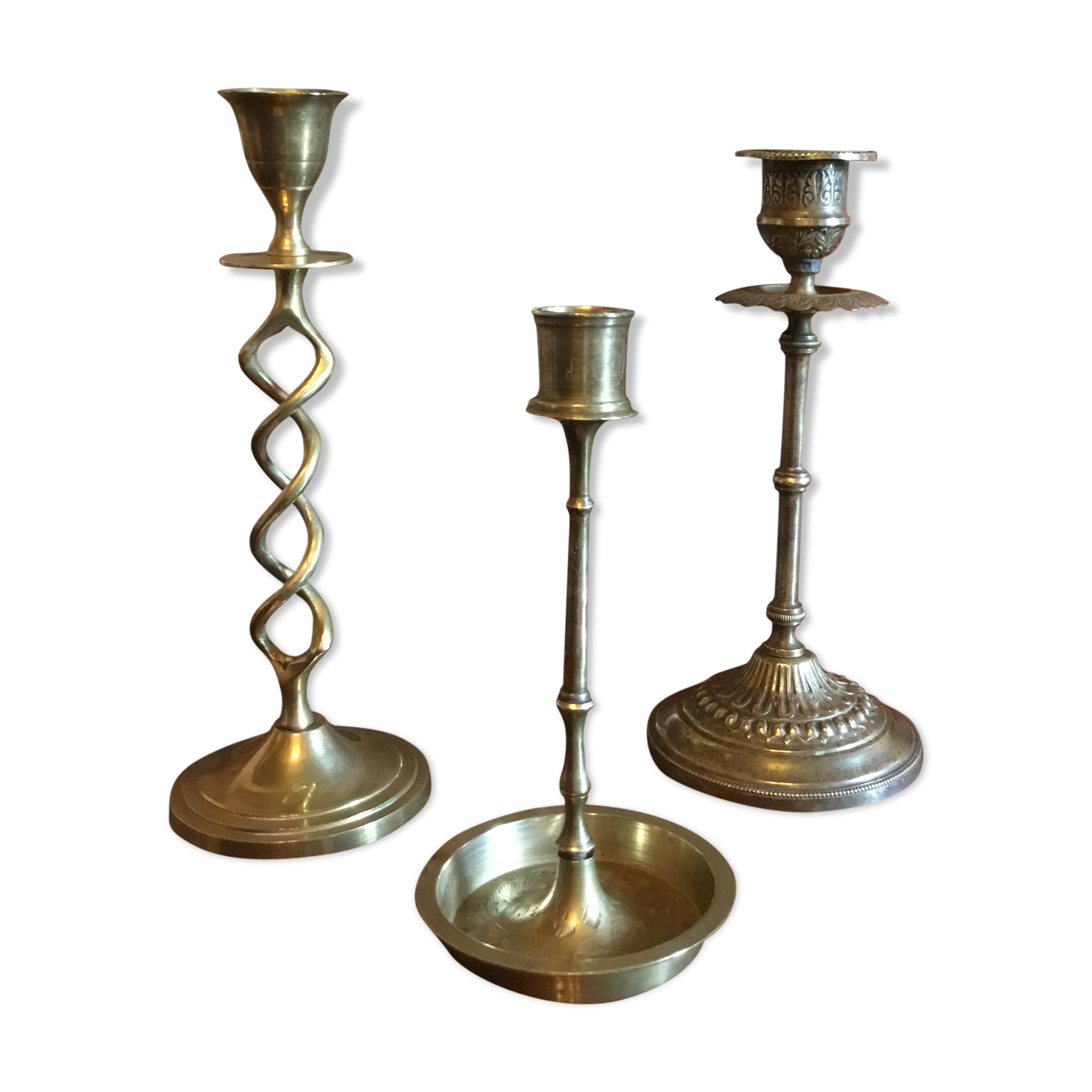 Three old candlesticks