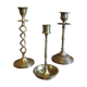 Three old candlesticks