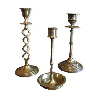 Three old candlesticks