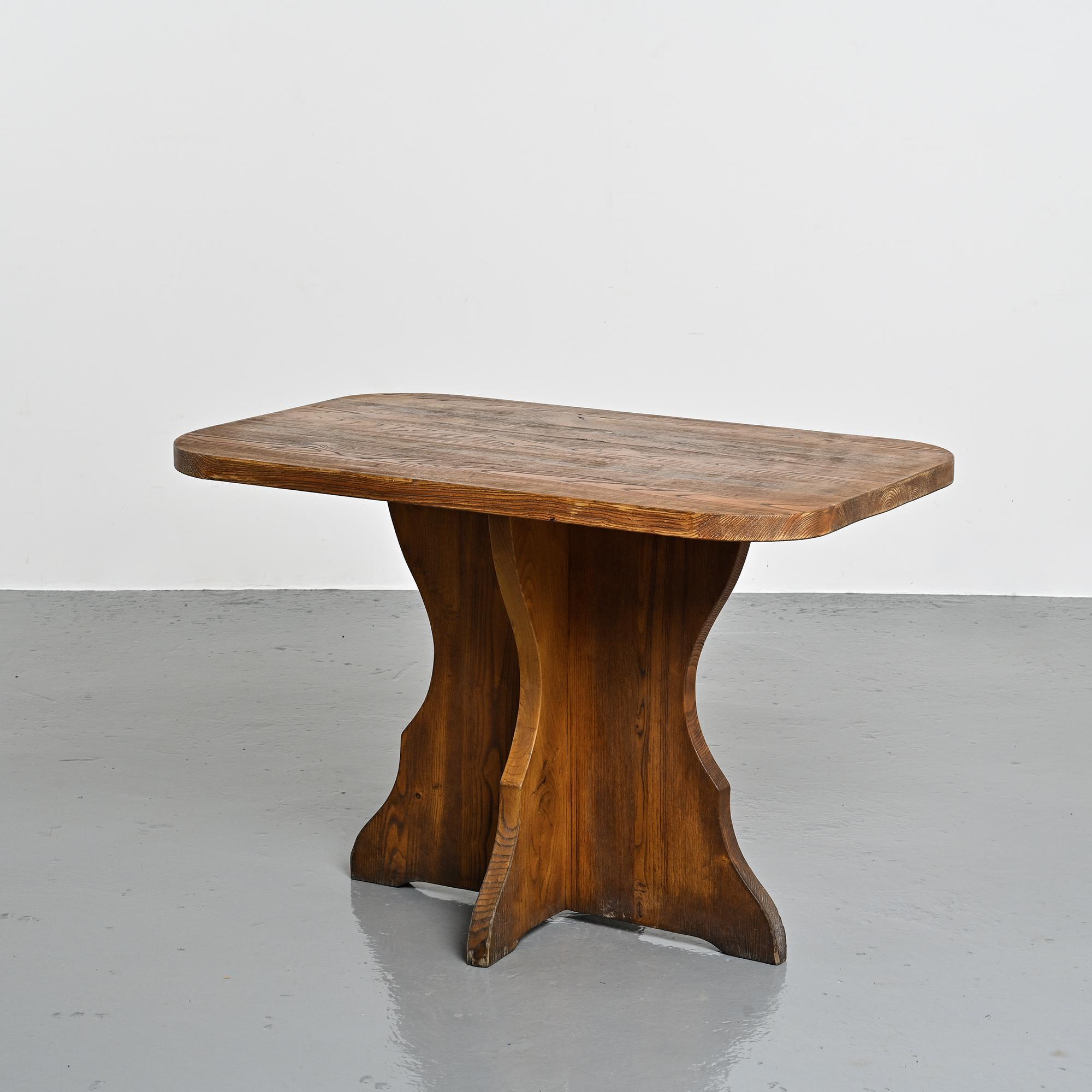 Solid wood dining table, French Alps, around 1970.