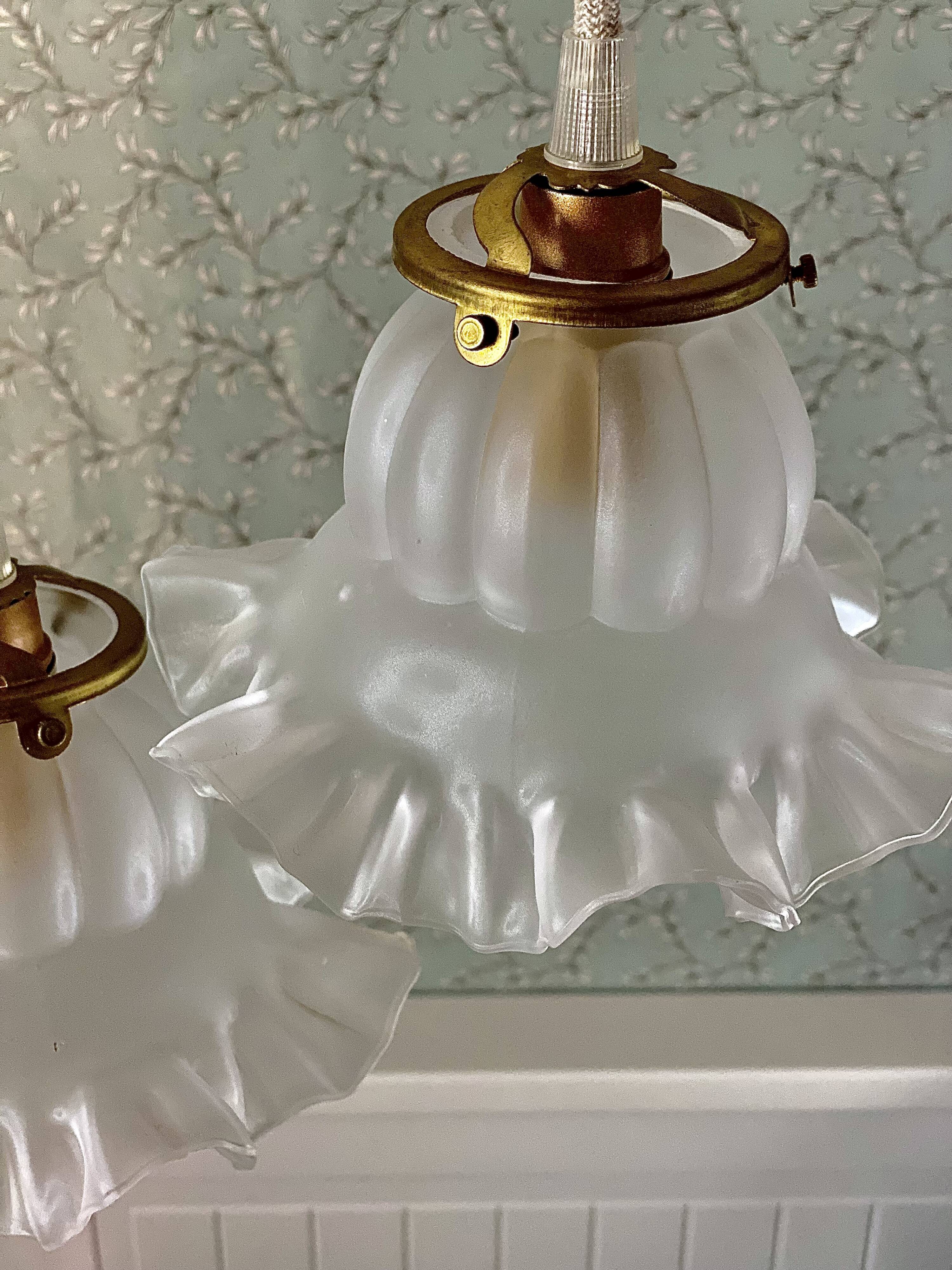 Two vintage tulip pendant lights in molded glass