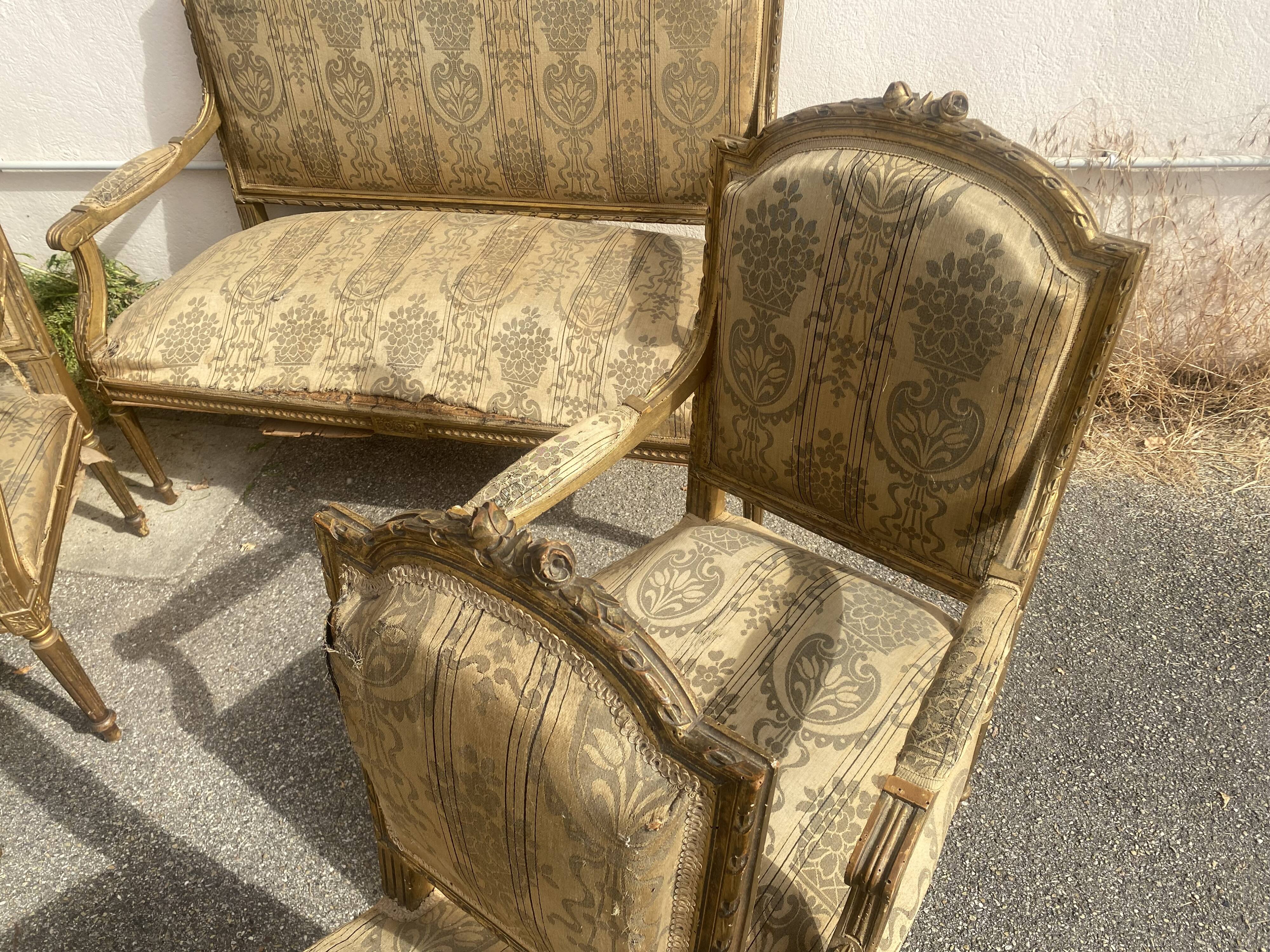 Louis XVI style living room in gilded wood. Napoleon III period