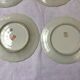 7 small plates in fine Limoges porcelain