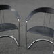 Quatre chaises avec accoudoirs style Arrben