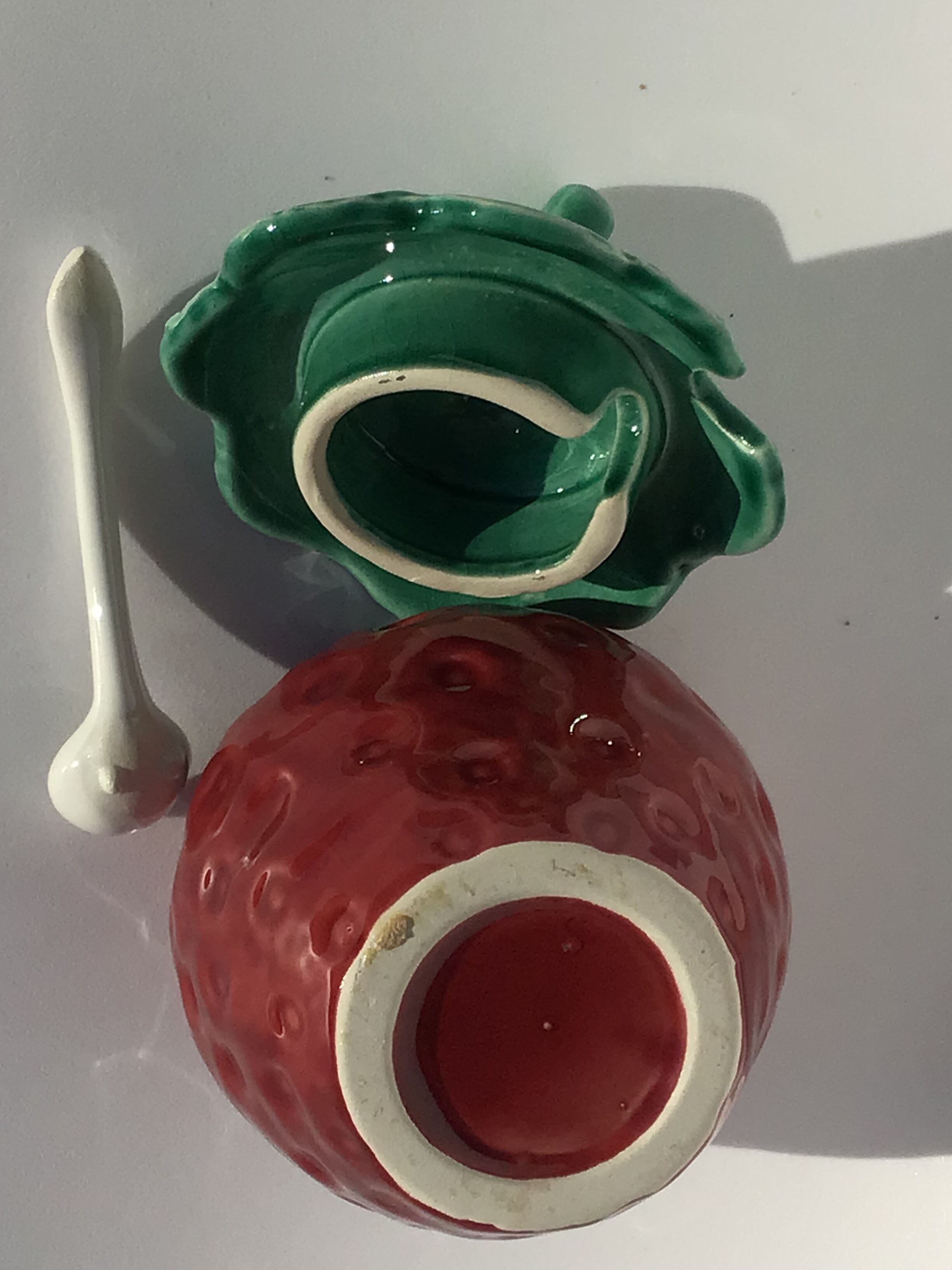 Slurry strawberry jam jar