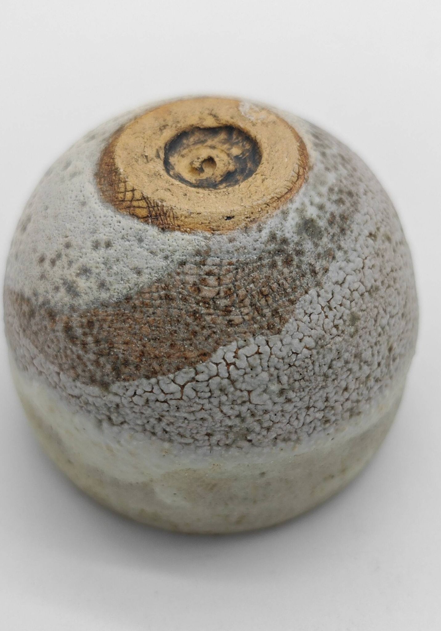 Trilogy of cups or Japanese-style goblets by the Danish ceramist Gutte Eriksen using RAKU technique.