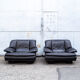 Pair of armchairs in black leather Italy 70s