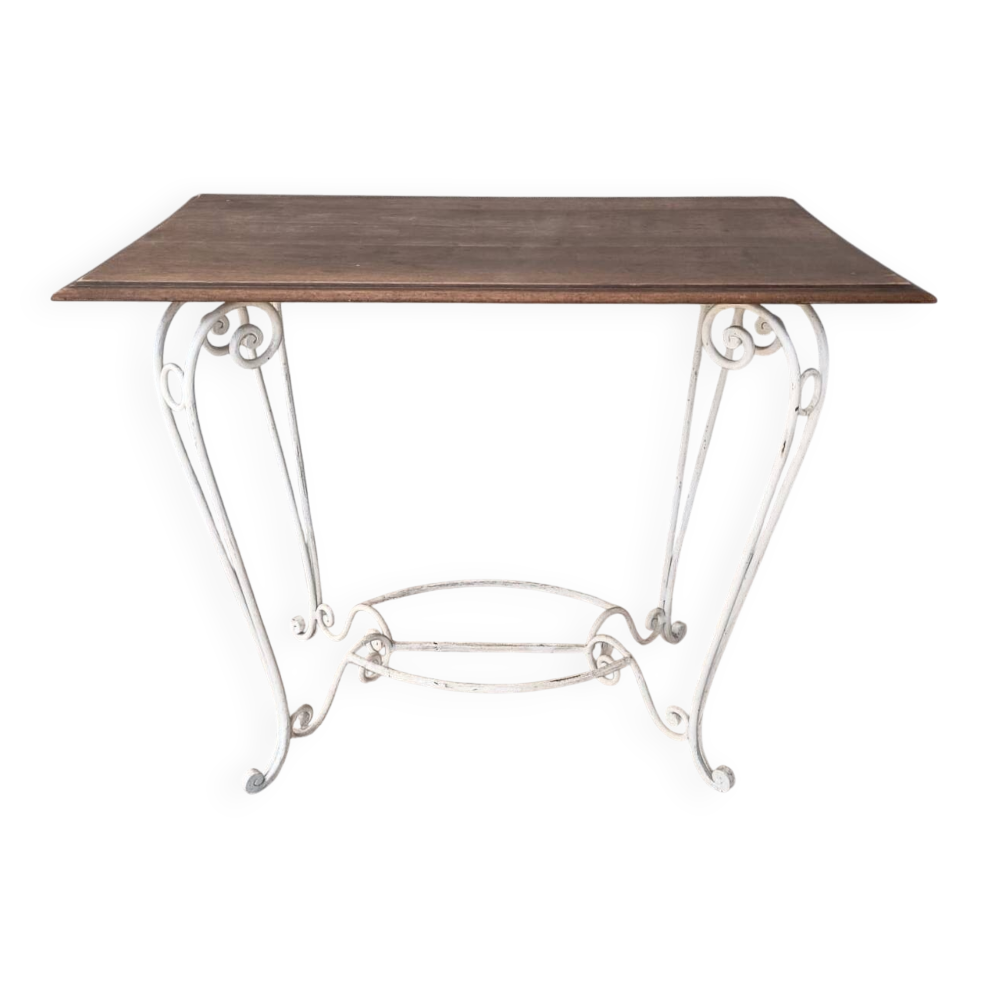 Wrought iron table with a walnut top.