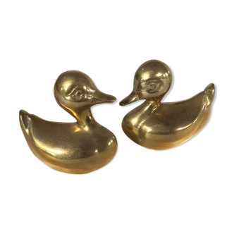 Couple brass ducks