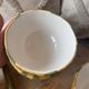 Old set of bowls and spoons in the shape of vintage pineapple