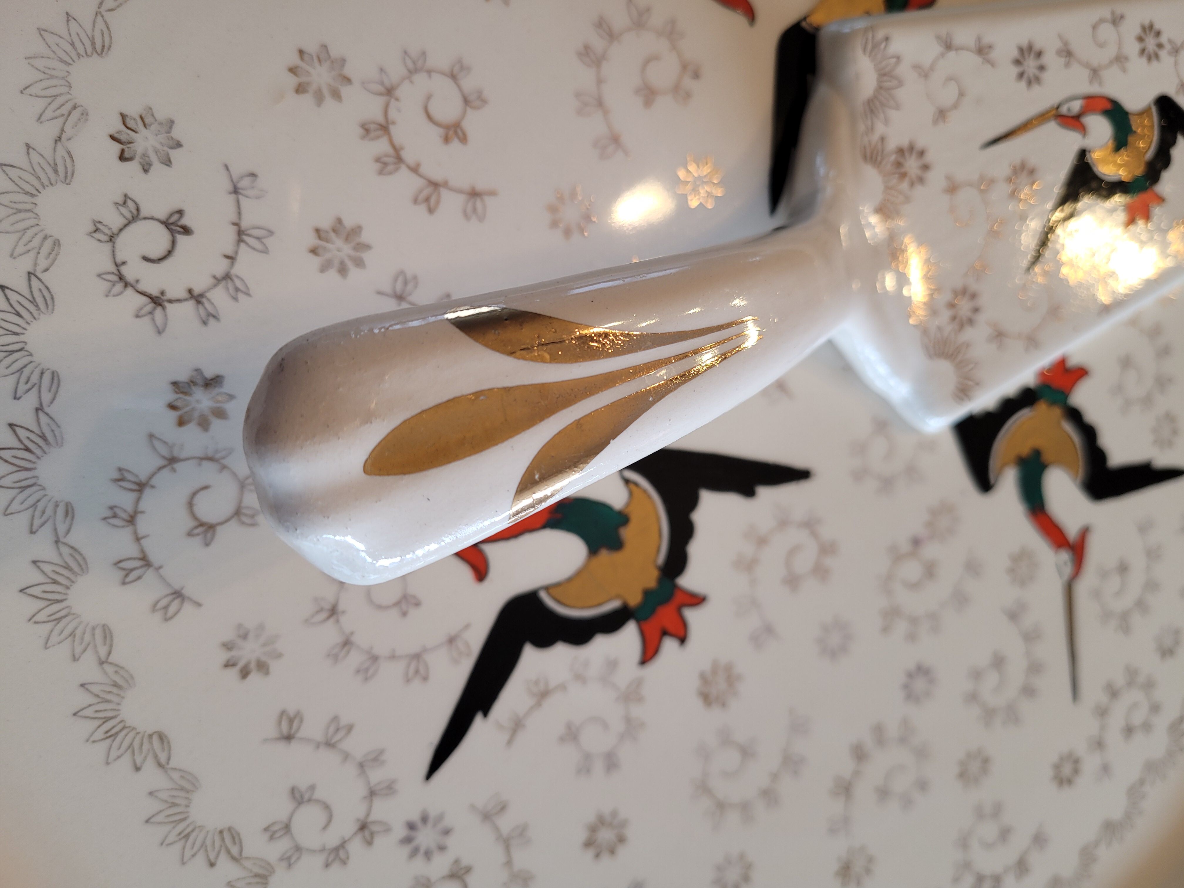 Longwy flat and porcelain pie shovel stork pattern
