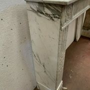 Louis XVI fireplace in 19th century white Carrara marble