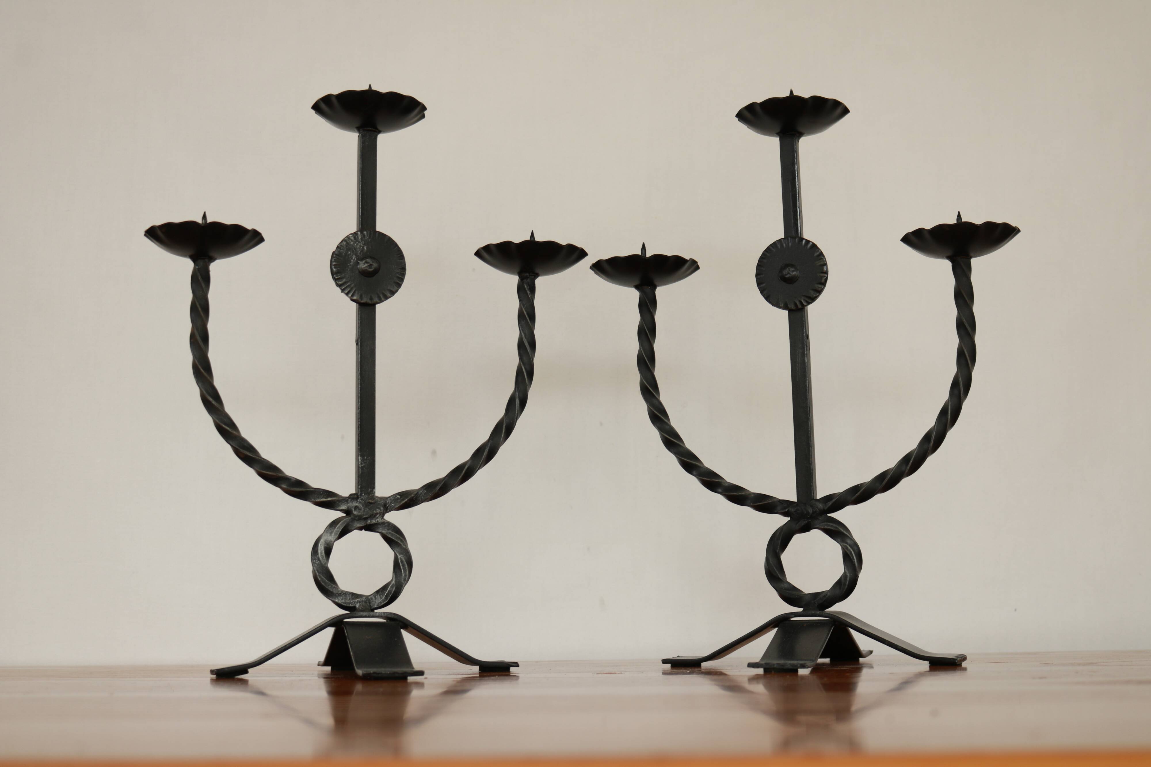 Brutalist style wrought iron candlesticks