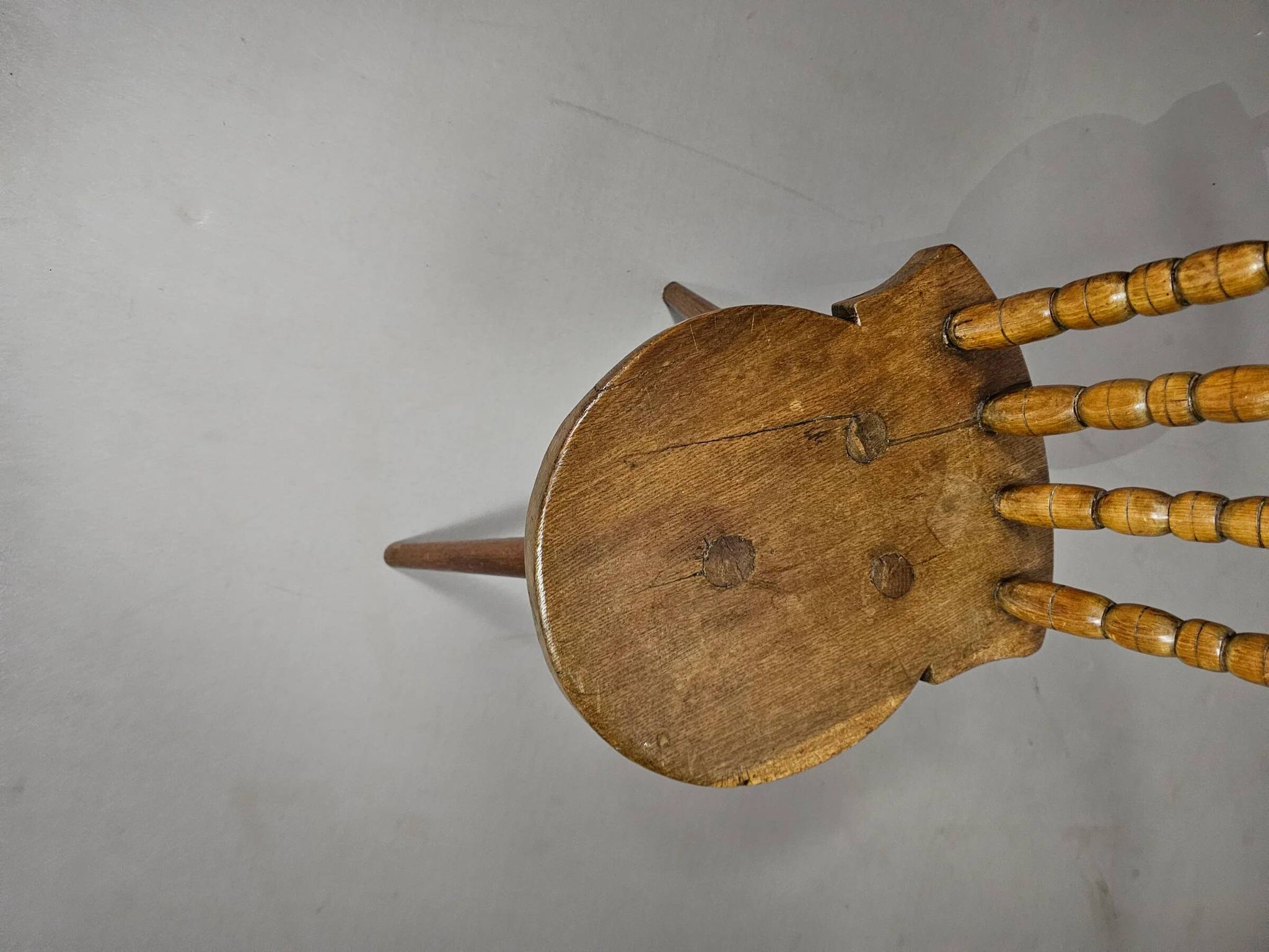 Old farmers tripod chair for decorative use