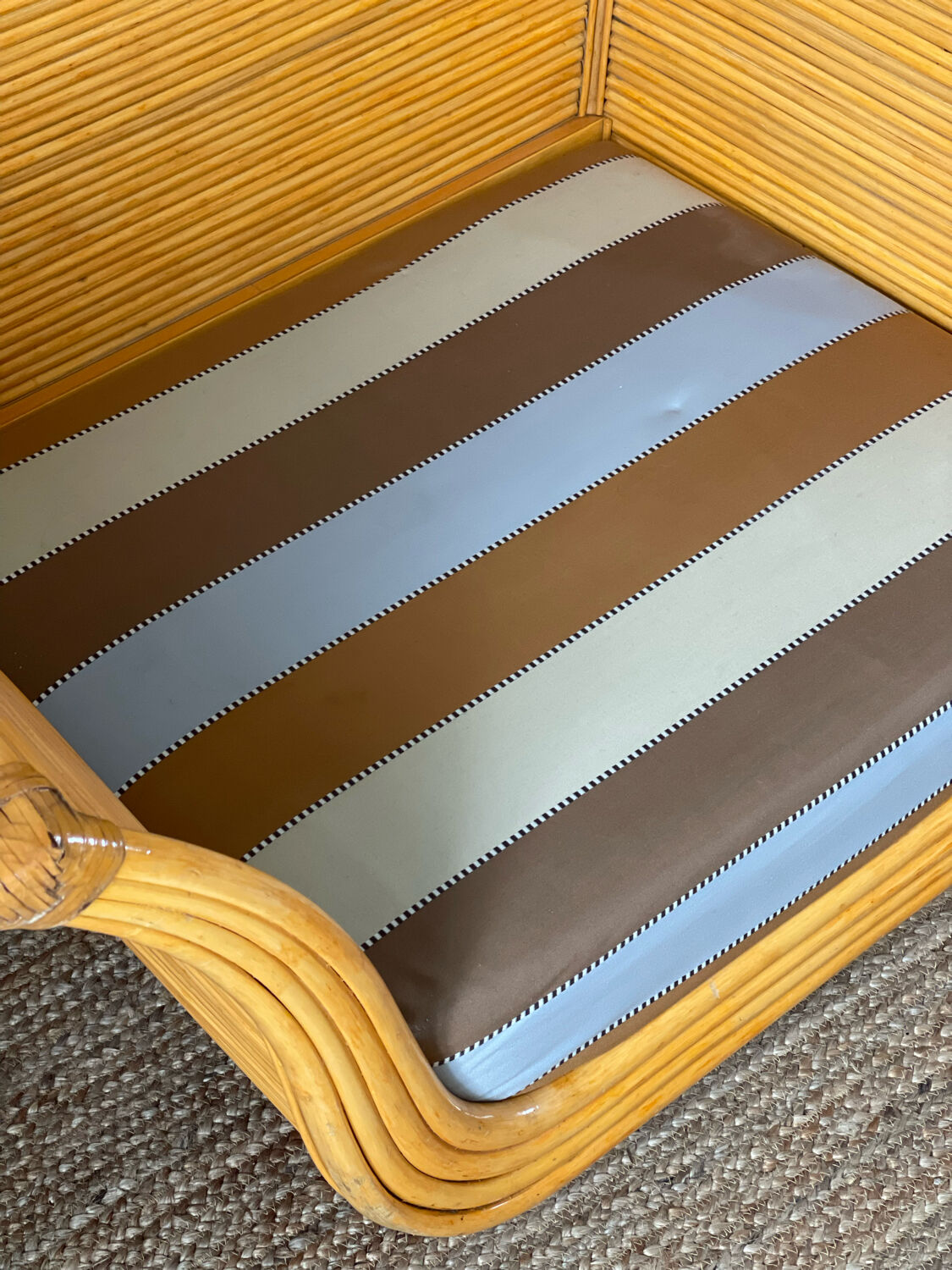 Maugrion armchair in rattan