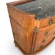 The demi-lune commode/ chest of drawers