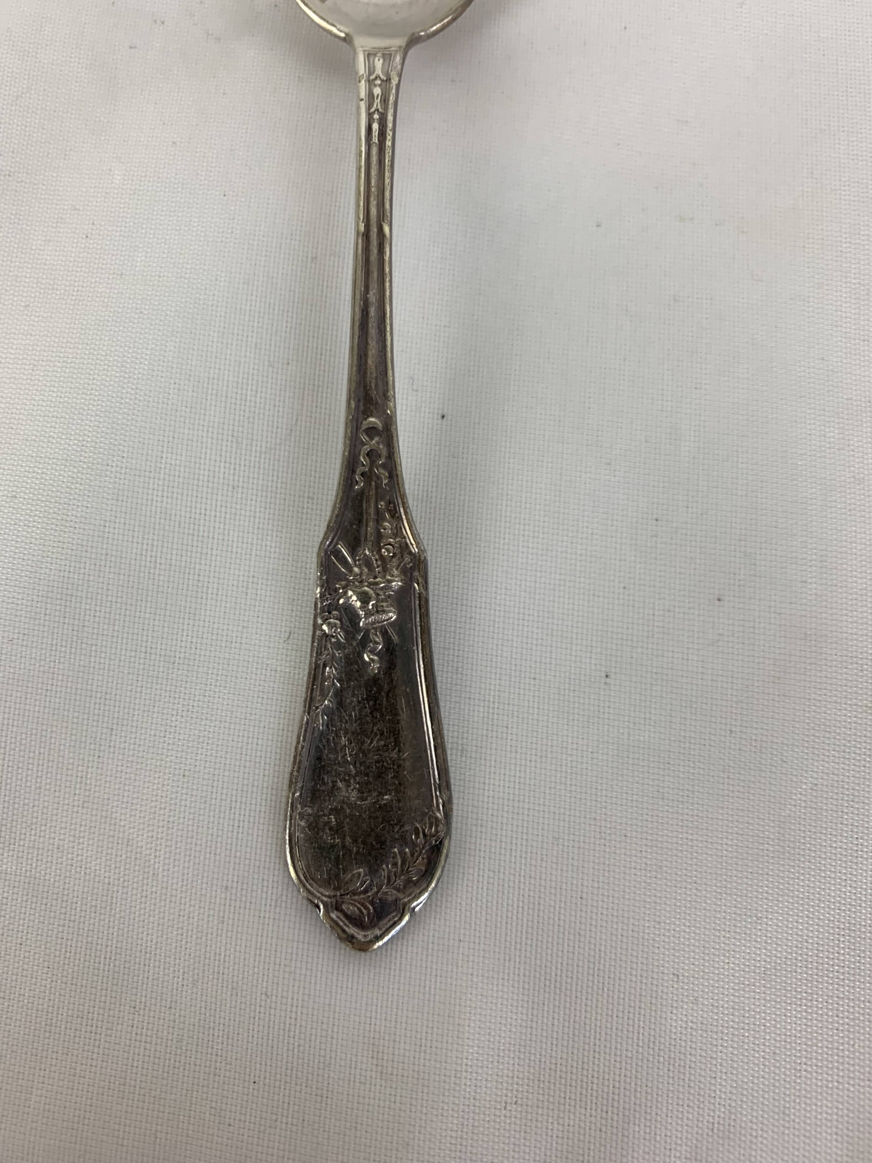 4 small silver metal spoons