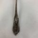 4 small silver metal spoons