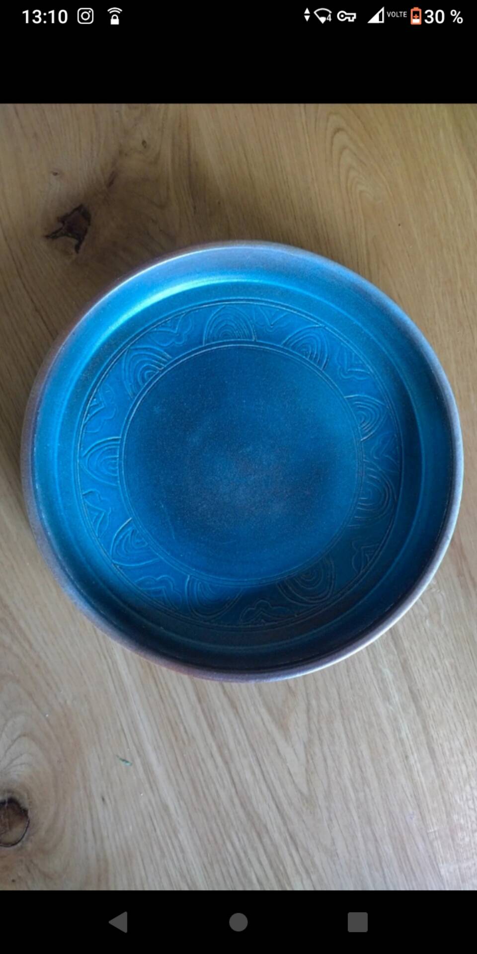 Vintage blue ceramic saucer dish bowl under pot