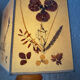 Turned wood lamp with a herbarium lampshade from the 1970s.