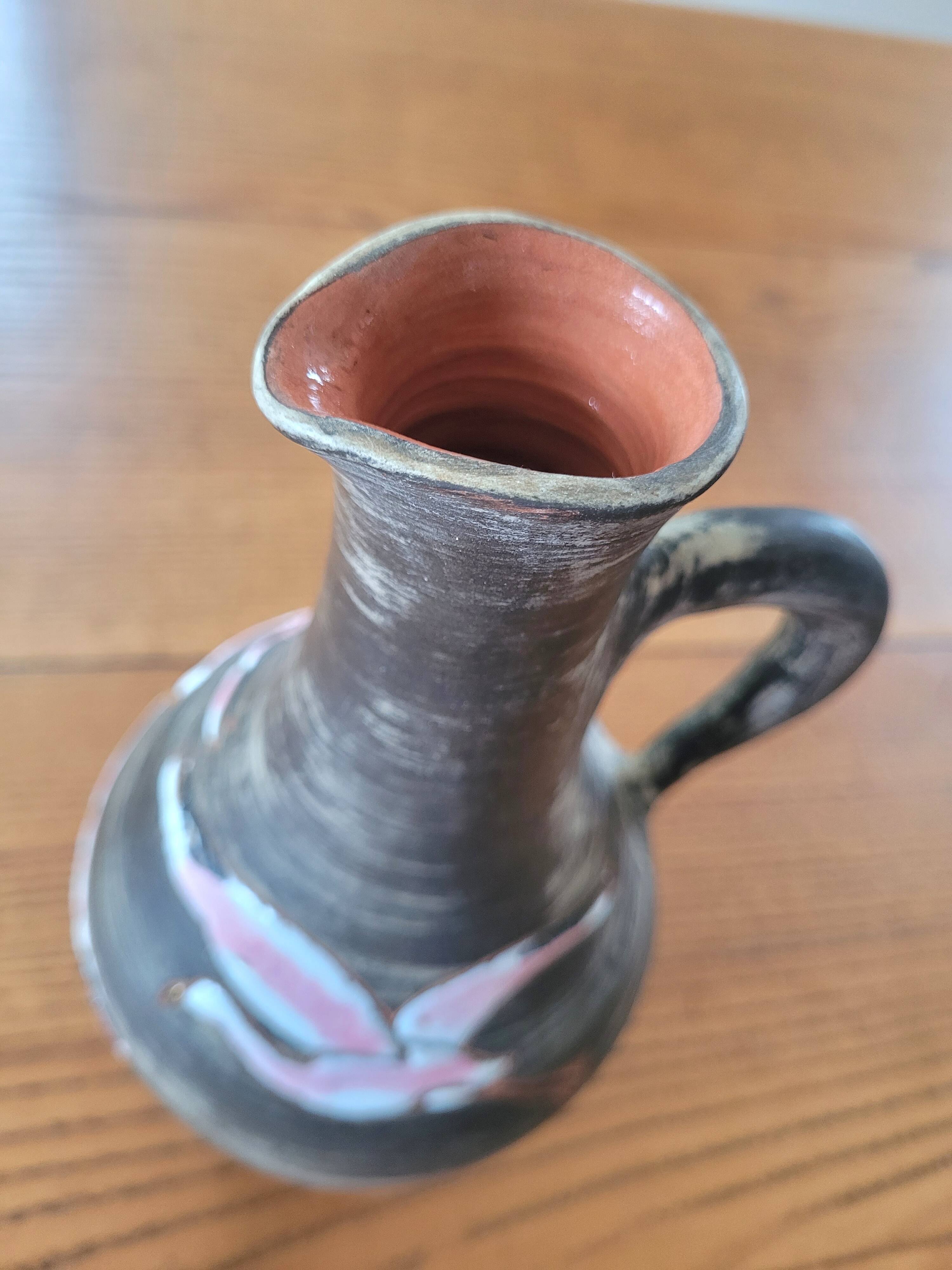 Rare signed ceramic and enameled porcelain pitcher