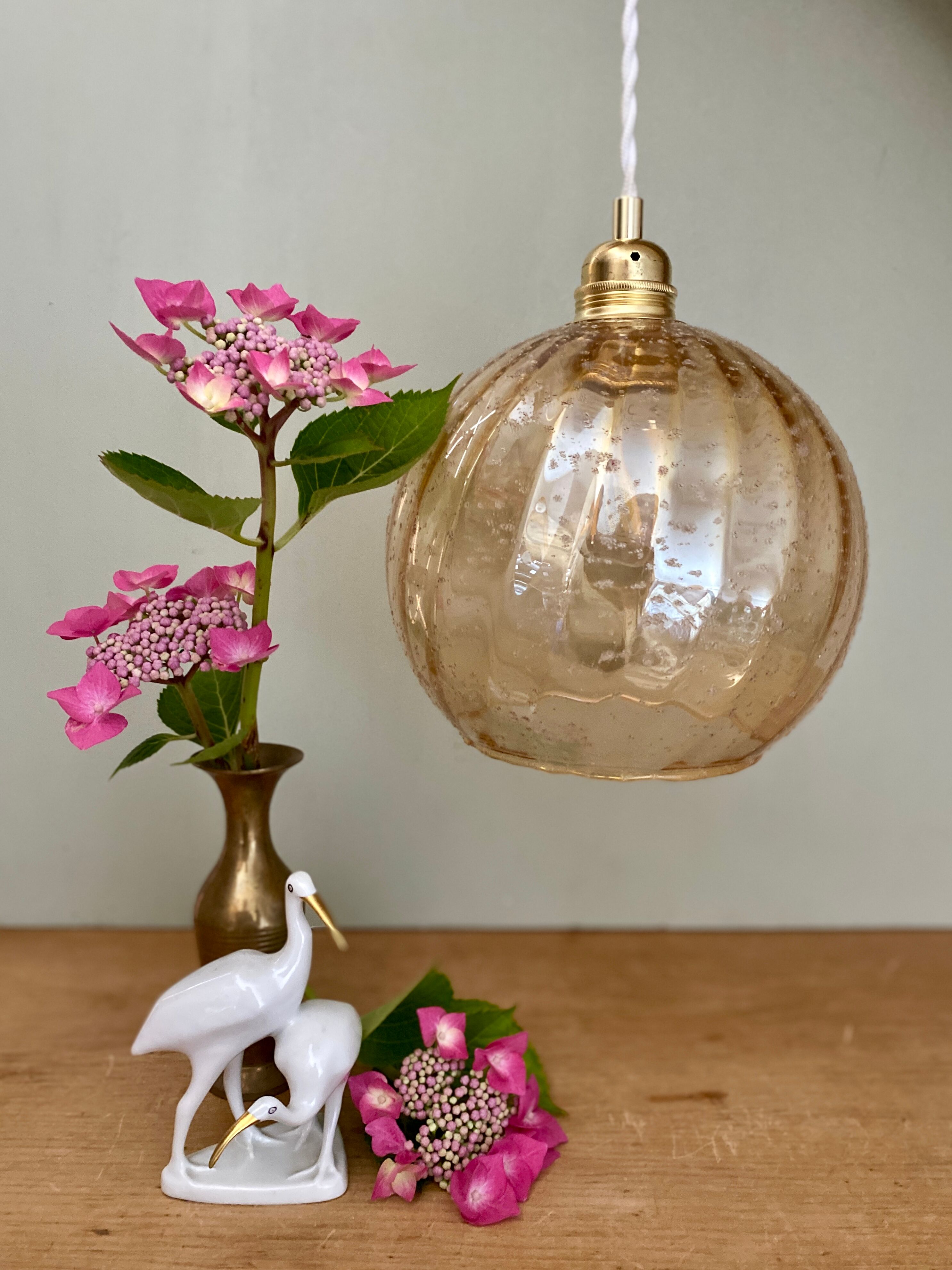 Vintage globe pendant lamp in amber glass