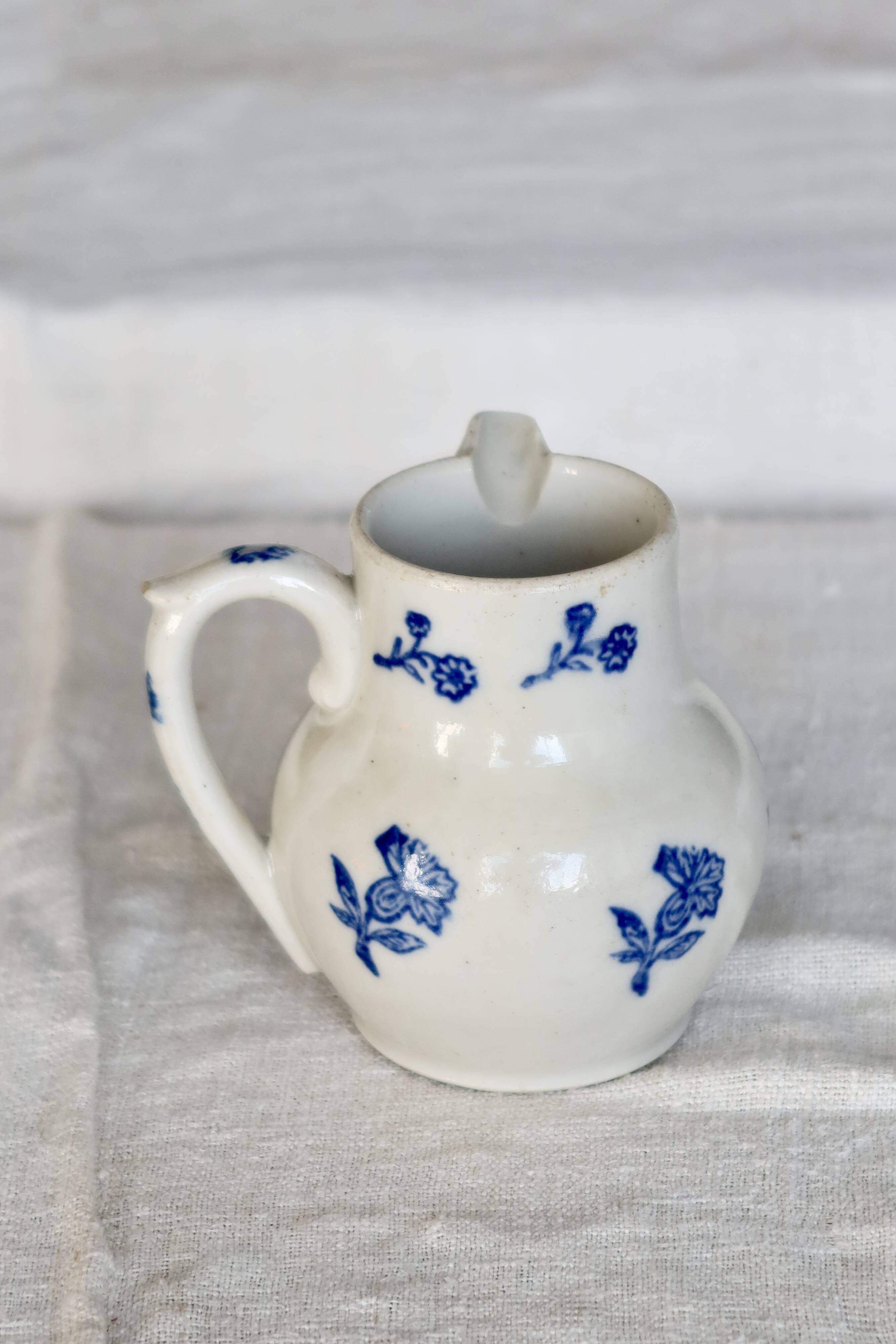 Antique Saint-Uze steel clay pitcher with cobalt blue floral pattern