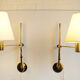 Pair orientable sconces V-393 Hans-Agne Jakobsson for AB Markaryd Sweden, brass