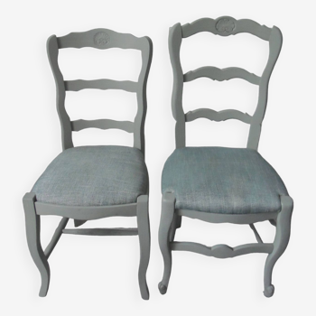 Duo of mismatched country-style chairs re-enchanted in verdigris, upholstered in a mottled fabric