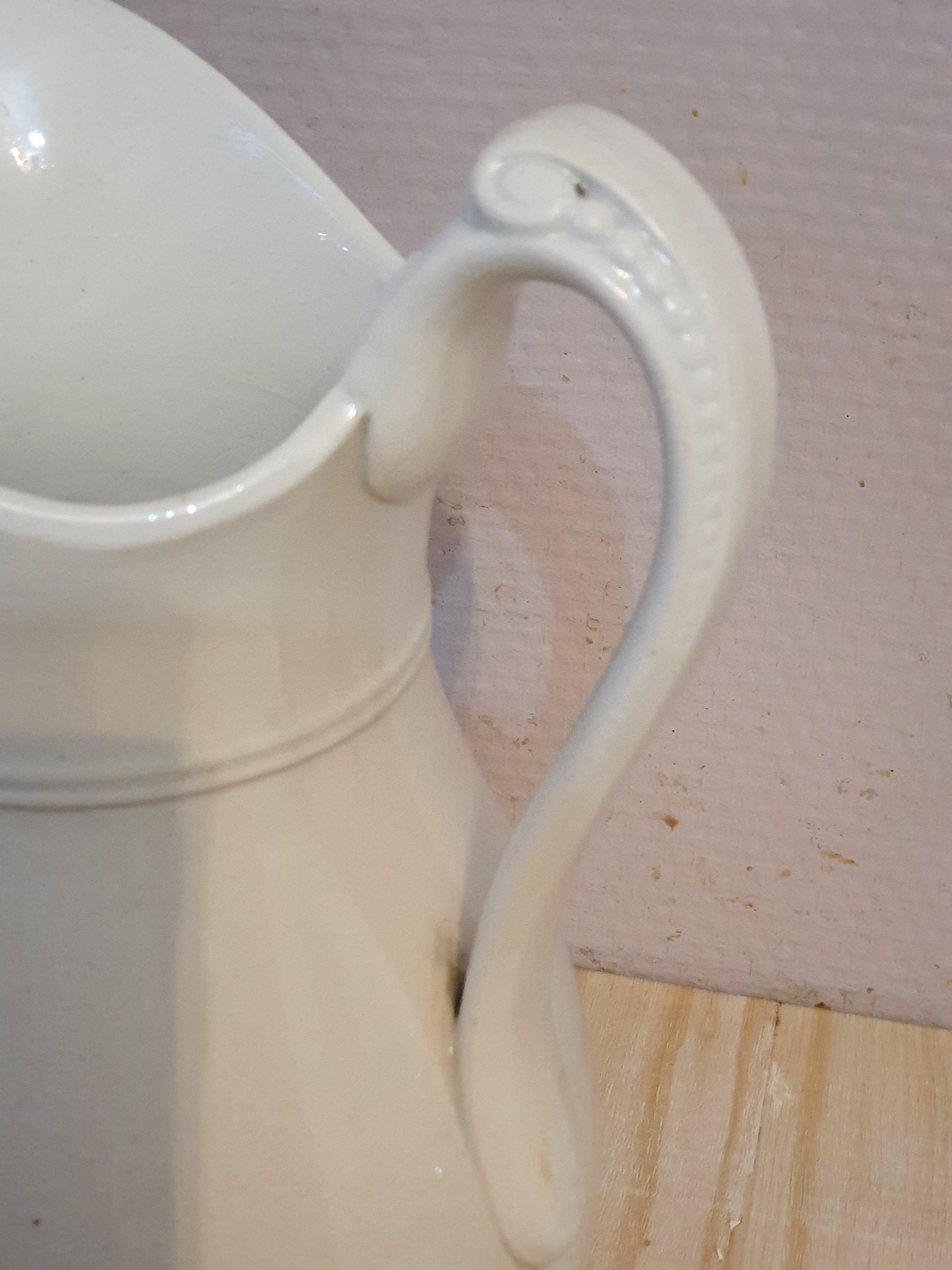 Antique pitcher pitcher in white porcelain