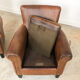 Set of two vintage leather armchairs