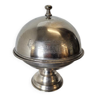 Old serving bell in silver metal