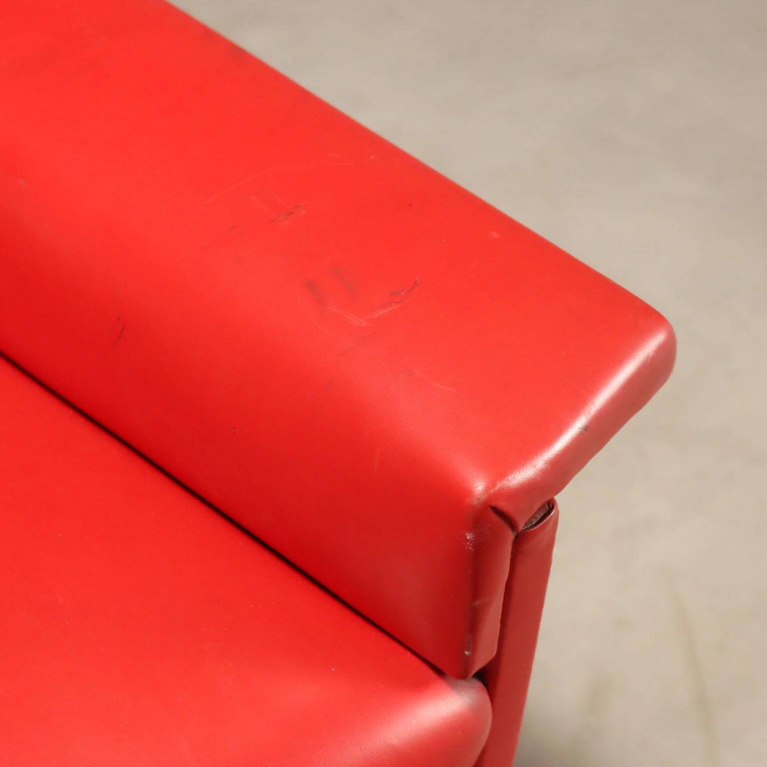 Vintage red faux leather sofa from the 1960s.