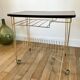 Rolling table vinyl row in formica and gold metal years 60-70