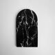 Small curved black marble plate
