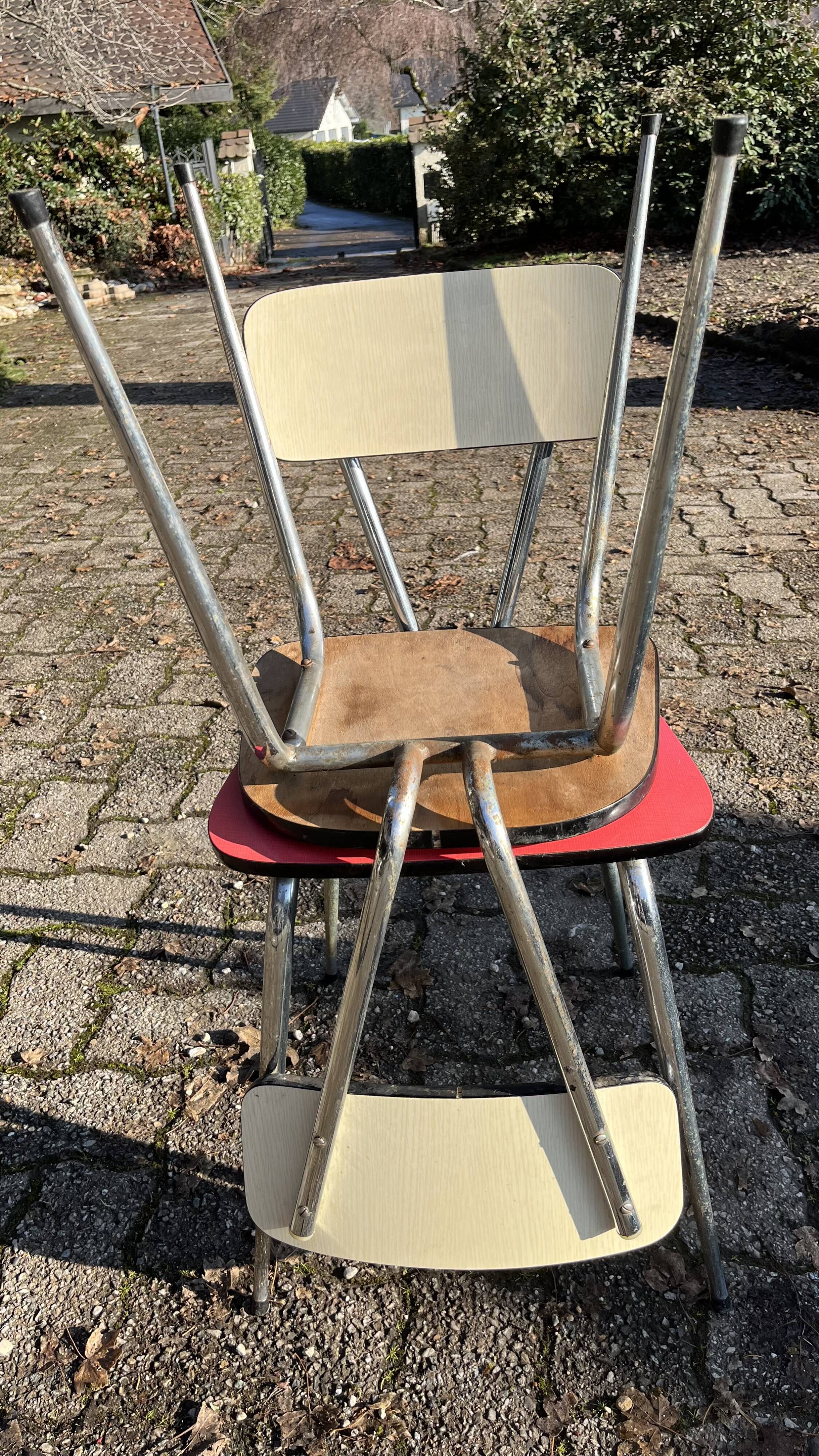 Red and cream Formica kitchen chairs