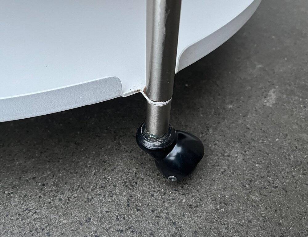 Minimalist Thrill metal coffee table or side table with wheels by Leitmotiv.