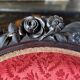 Napoleon III medallion armchair in carved wood and red velvet.