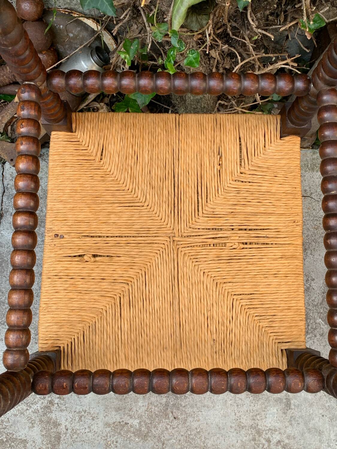 1920s turned wood straw corner chair