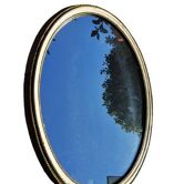 Ancien miroir ovale guilloché doré et peint