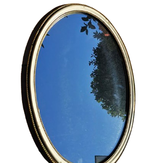 Old oval guilloche mirror, gilded and painted