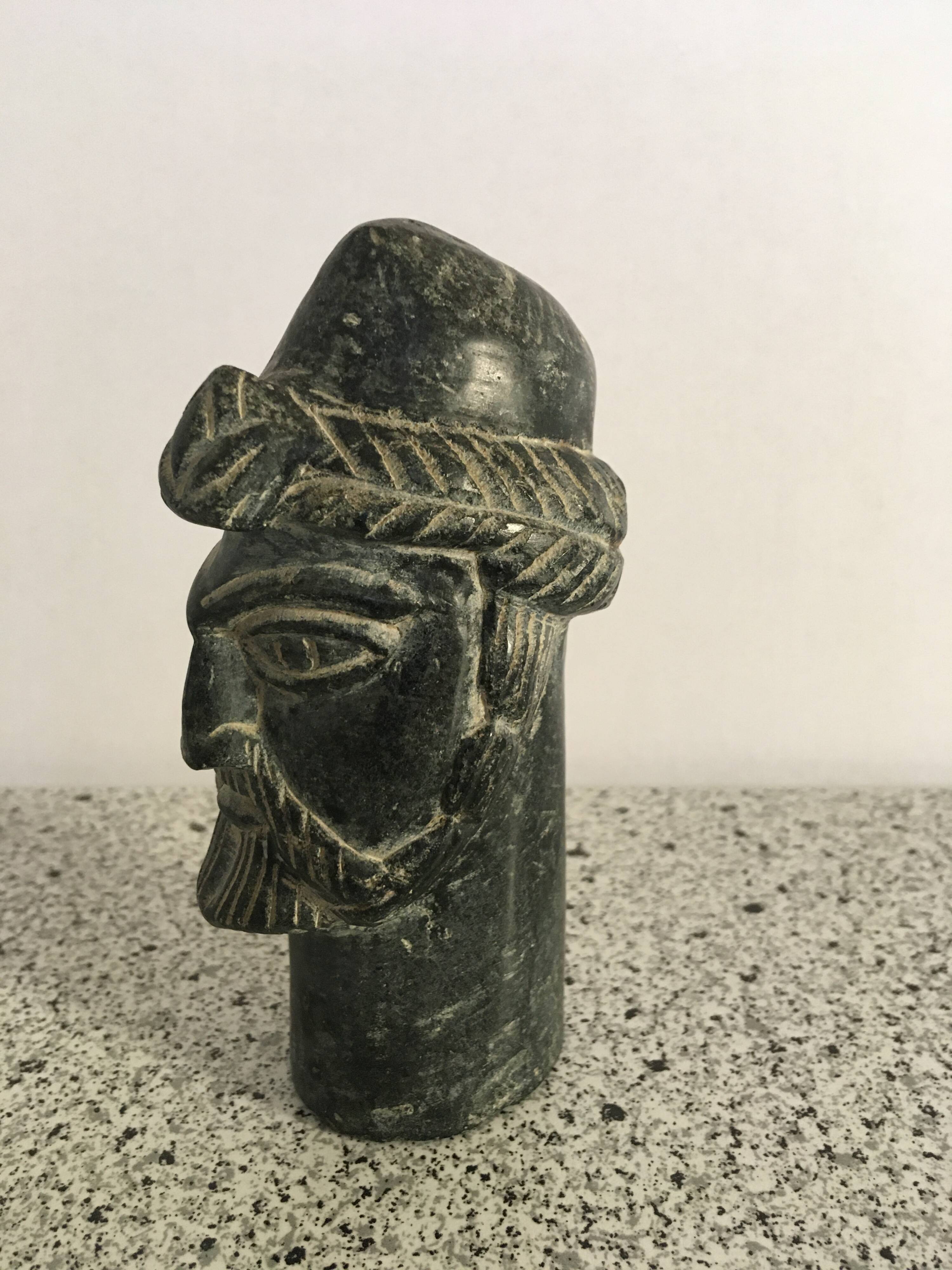 Black marble bust sculpture
