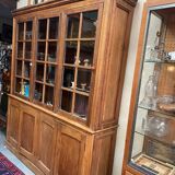 Meuble vitrine de magasin ancien en chêne