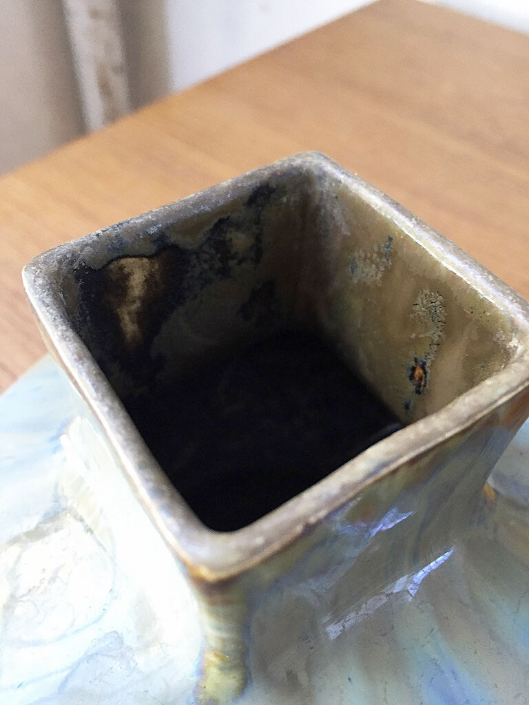 Small blue ceramic vase