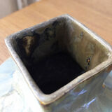 Small blue ceramic vase