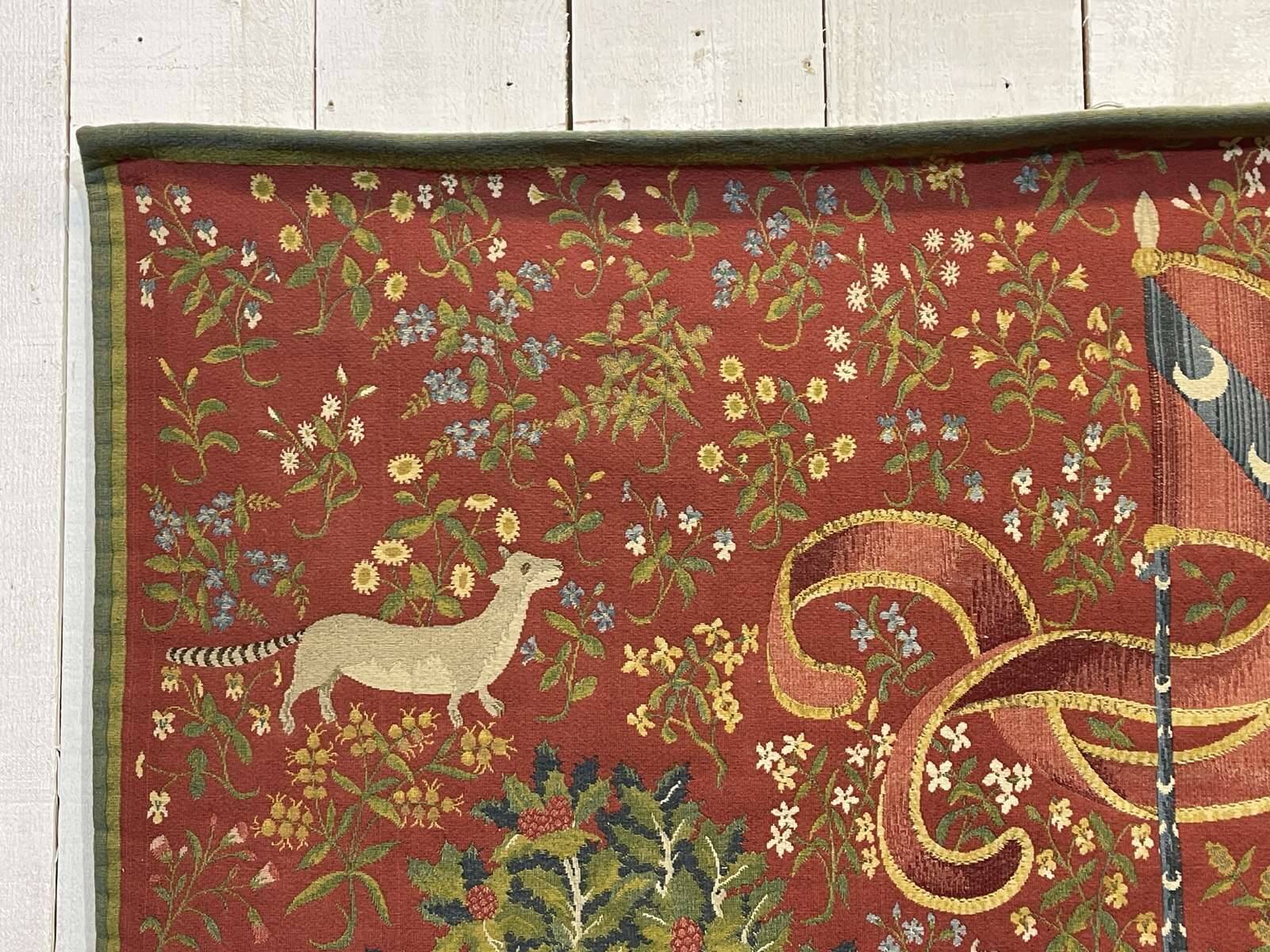 Medieval-style handmade tapestry, named Lady with the Unicorn.